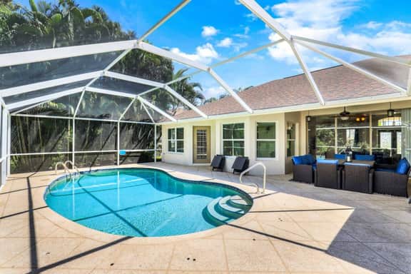 Guard gated 4 bedroom- Pool home - Close to the beach & 5th ave shops & food!