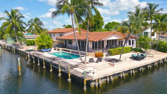 Waterfront 7-BR Estate w/ 300 ft Waterfront, Private Pool & Sleeps 16